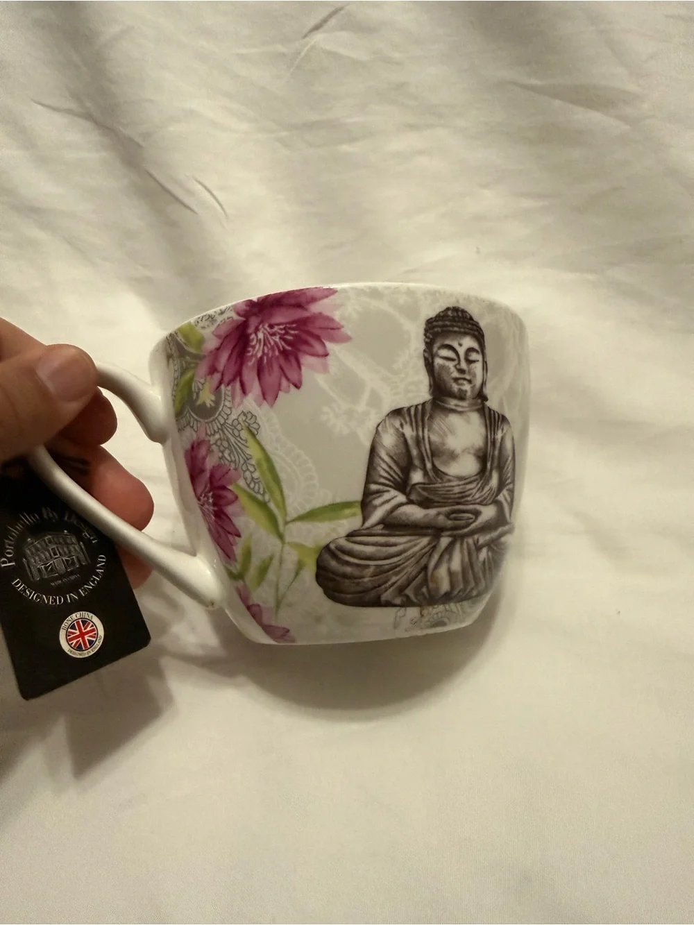 Buddha Stoneware Tea Cup - White and Black with Floral Accents